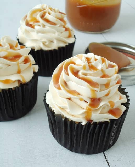 Dark Chocolate Salted Caramel Cupcakes - A decadent chocolate cupcake with salted caramel drizzled over mocha buttercream frosting. | BlahnikBaker.com