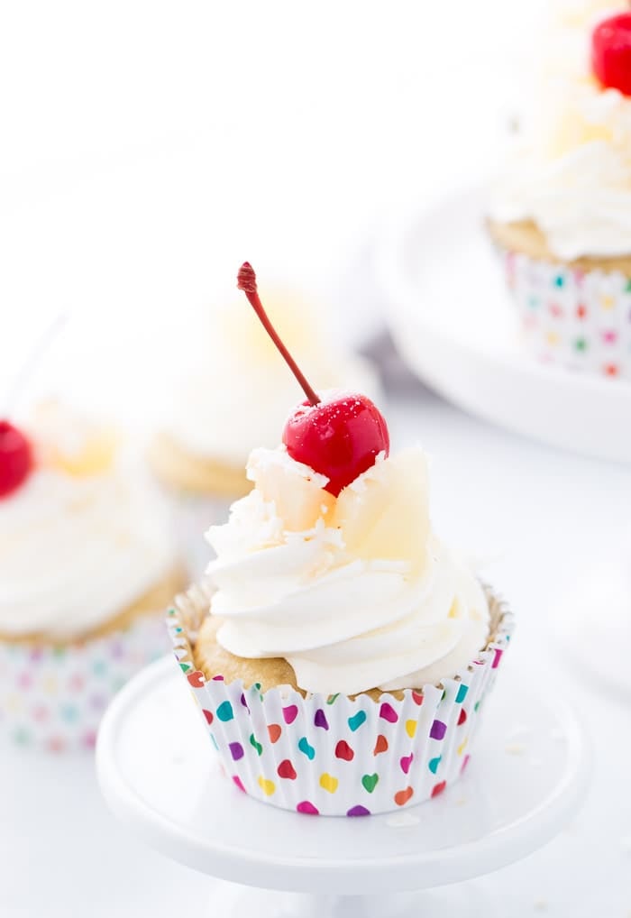 This Pina Colada cupcakes recipe is full of tropical flavor, making you feel as though you're sipping on the classic frozen cocktail.