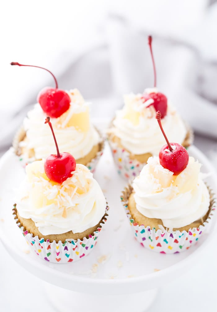 This Piña Colada cupcakes recipe is full of tropical flavor, making you feel as though you're sipping on the classic frozen cocktail.