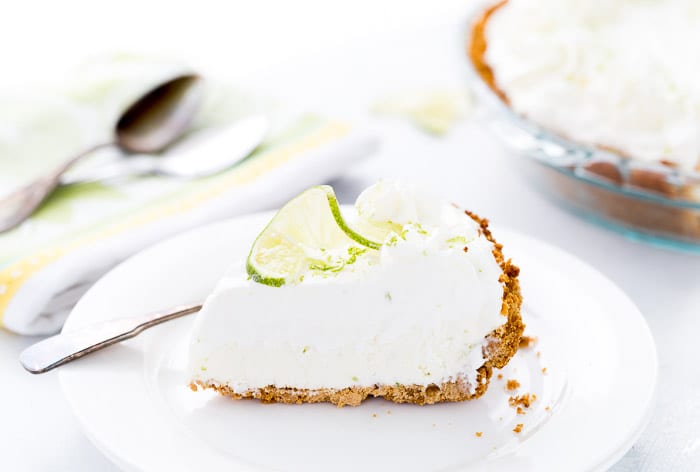 This no bake frozen margarita pie recipe is sweet, tangy and refreshing. Creamy cream cheese and tart lime juice in the perfect summer pie. 