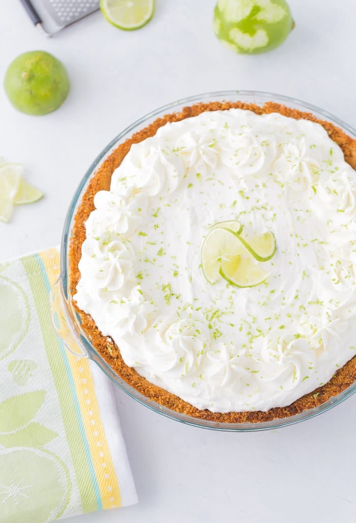 This no bake frozen margarita pie recipe is sweet, tangy and refreshing. Creamy cream cheese and tart lime juice in the perfect summer pie. 