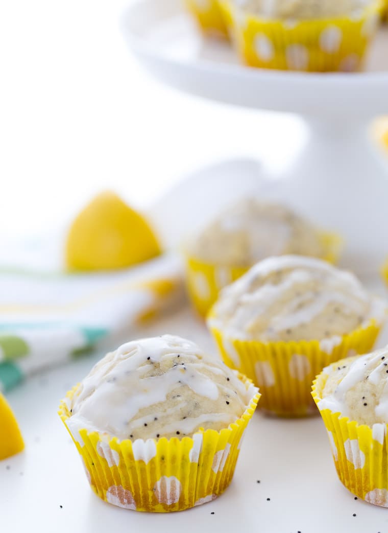 Lemon poppy seed muffins are moist and packed with fresh lemon zest and juice. These lemon poppy seed muffins are what every breakfast should be made of! | Recipe on BlahnikBaker.com