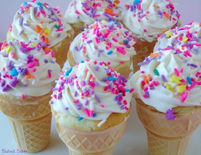 Funfetti ice cream cone cupcakes will be your new favorite summer treat! Fluffy, moist vanilla cupcakes are baked in ice cream cones and topped with whipped vanilla bean frosting. Funfetti Ice Cream Cone Cupcakes