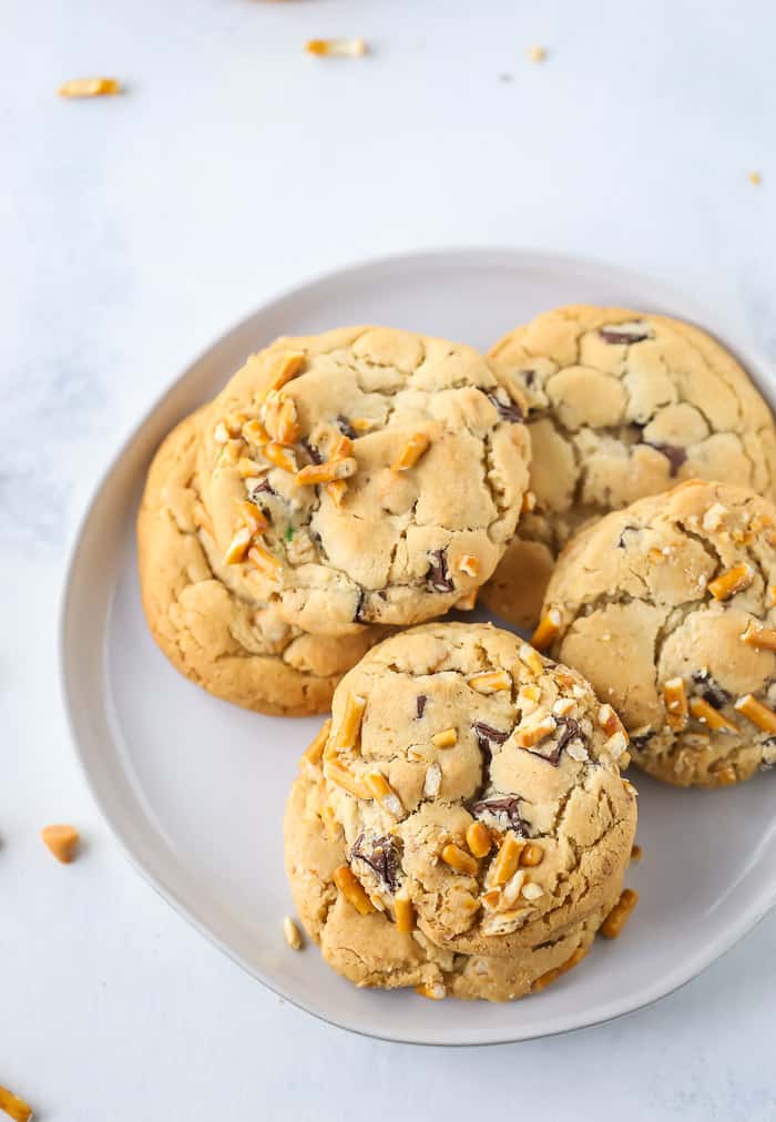 Butterscotch Pretzel Chocolate Chip Cookies on a white plate.