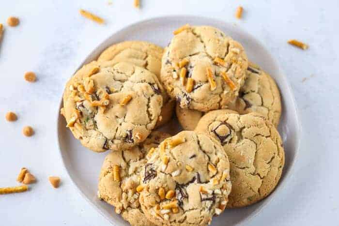 Butterscotch Pretzel Chocolate Chip Cookies on a white plate.