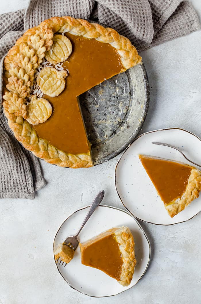 Creamy and delicious pumpkin coconut pie is topped with toasted coconut flakes. You will want this on your Thanksgiving table!