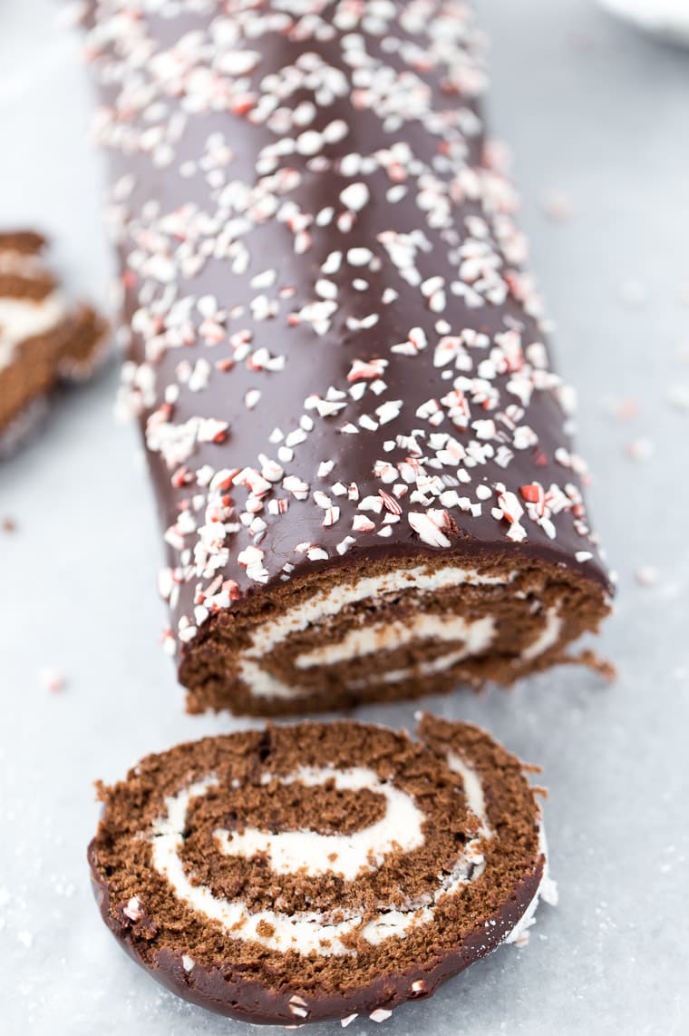 A standard chocolate genoise cake and peppermint frosting makes this peppermint chocolate roll cake an instantaneous vacation favourite. 