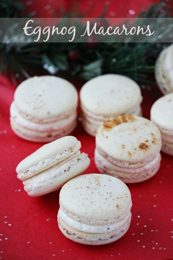 Eggnog macarons are perfectly spiced holiday cookies, with hints of cinnamon, cloves and nutmeg, filled with creamy eggnog buttercream. | Recipe on BlahnikBaker.com