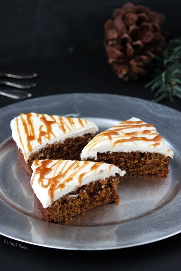 Gingerbread Cake with Molasses Buttercream Frosting - Gingerbread cake, moist and flavorful, with molasses buttercream and salted caramel drizzle. A holiday dessert that will surely become a new favorite! | Recipe on BlahnikBaker.com