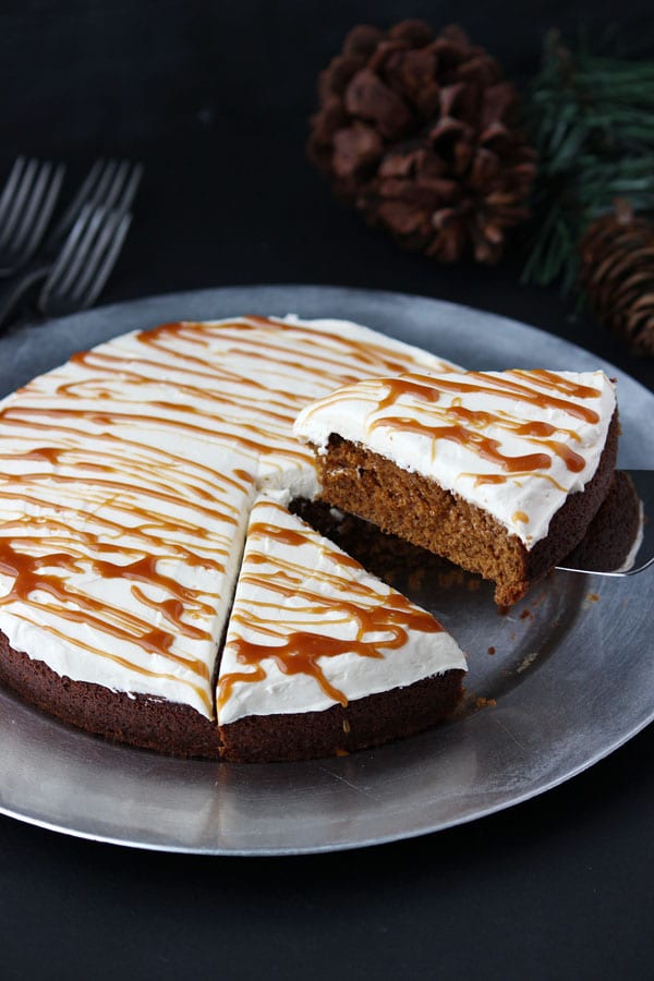 Gingerbread Cake with Molasses Buttercream Frosting - Gingerbread cake, moist and flavorful, with molasses buttercream and salted caramel drizzle. A holiday dessert that will surely become a new favorite! | Recipe on BlahnikBaker.com