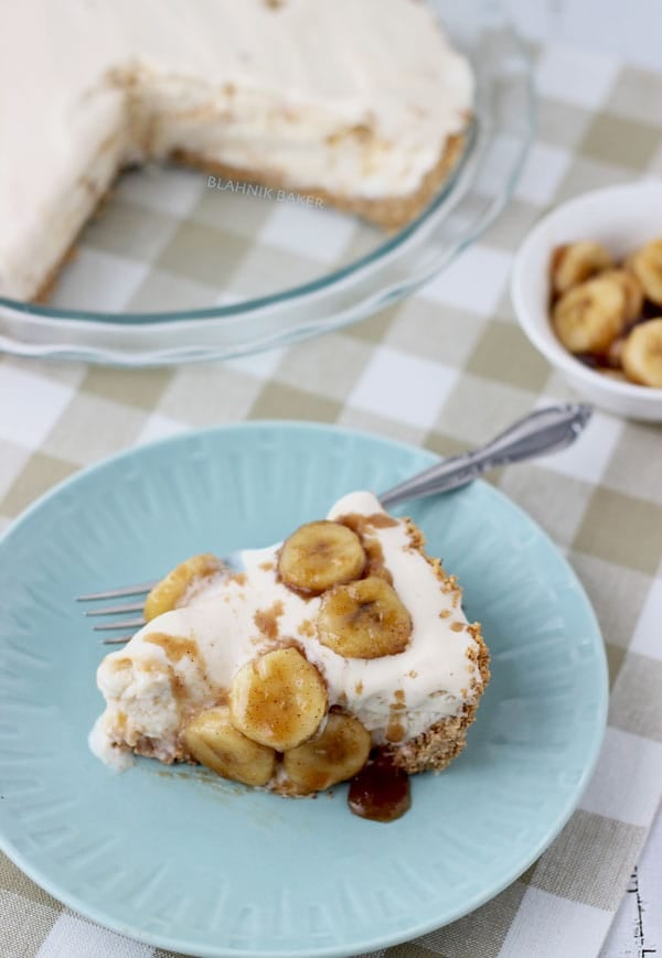 Pecan praline ice cream on top of a graham cracker crust is topped off with brown butter and brown sugar caramelized bananas in this classic banana foster pie.