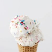 Golden oreos are crushed and stuffed into a creamy homemade funfetti ice cream for the perfect spring into summer treat!