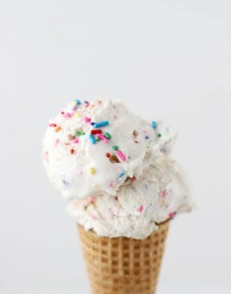 Golden oreos are crushed and stuffed into a creamy homemade funfetti ice cream for the perfect spring into summer treat!