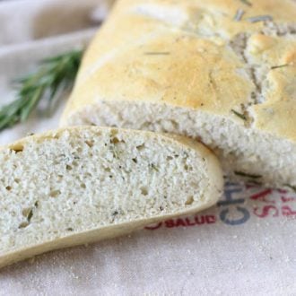This classic rosemary olive oil bread recipe yields a very soft bread on the inside with a golden crunchy crust. Incredibly easy to make too.