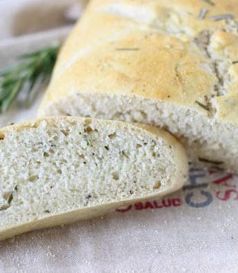 This classic rosemary olive oil bread recipe yields a very soft bread on the inside with a golden crunchy crust. Incredibly easy to make too.