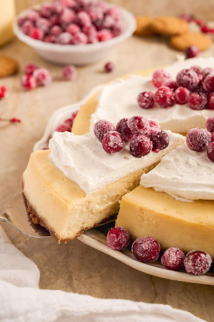 Creamy eggnog cheesecake with a spiced gingersnap crust... you are going to want this decadent dessert this holiday season!