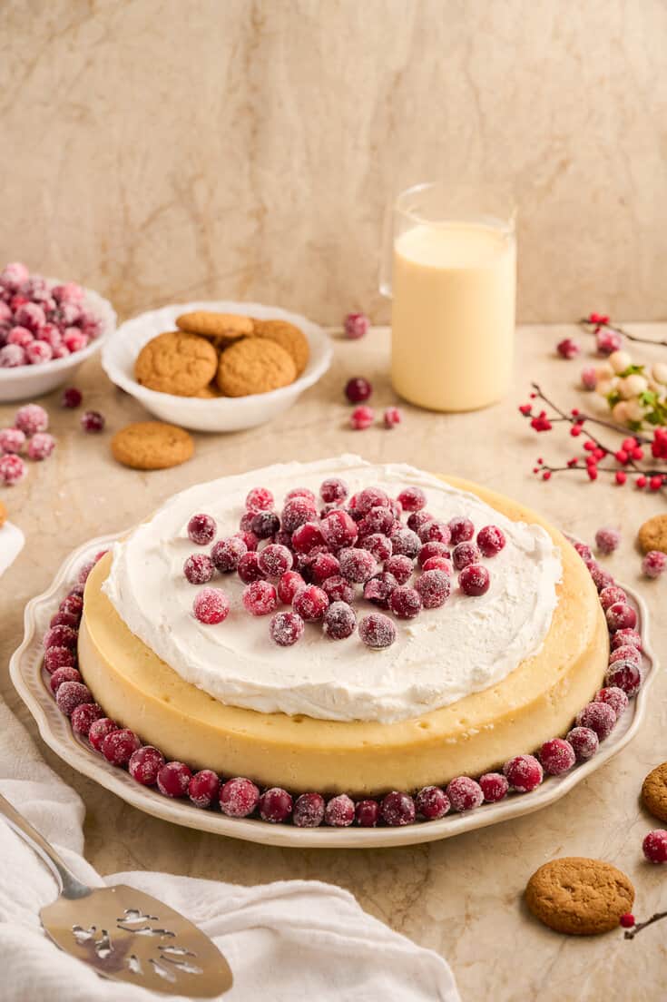 Creamy eggnog cheesecake with a spiced gingersnap crust... you are going to want this decadent dessert this holiday season!