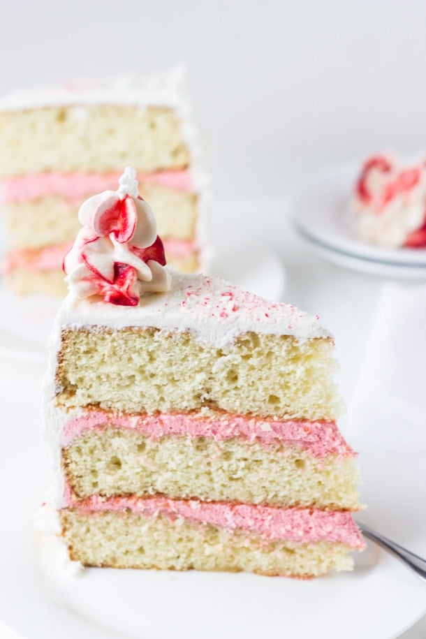 Peppermint White Chocolate Cake - a moist white chocolate cake layered in a cool peppermint whipped frosting!