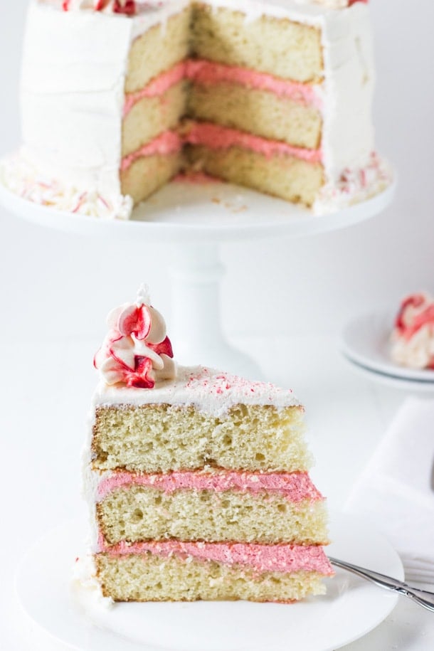 Peppermint White Chocolate Cake - a moist white chocolate cake layered in a cool peppermint whipped frosting!