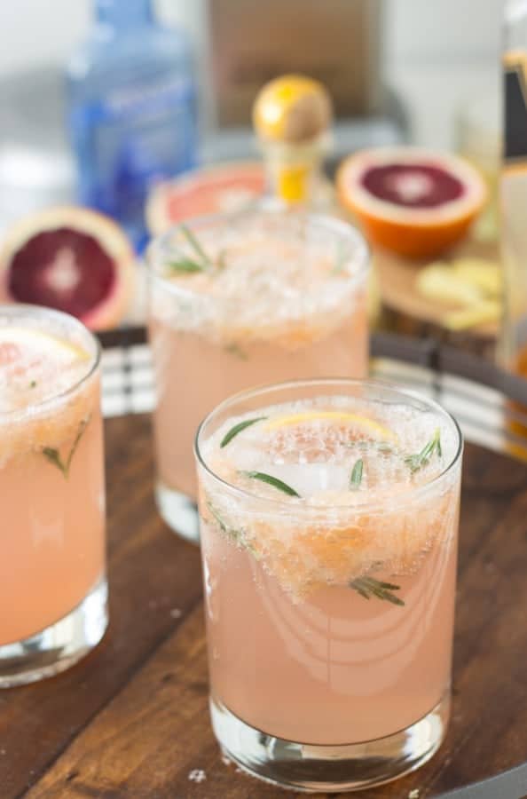Sparking grapefruit cocktails are the perfect holiday brunch cocktail! Sparkling Grapefruit Rosemary Cocktail- refreshing and delicious!