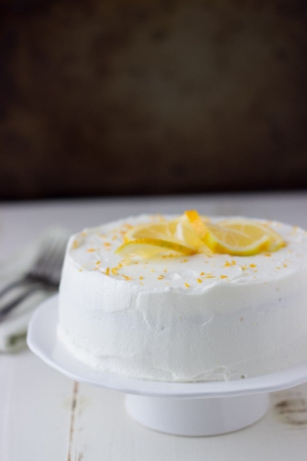 Meyer Lemon Cake with White Chocolate Mousse - a small scale soft lemon cake topped with whipped white chocolate mousse