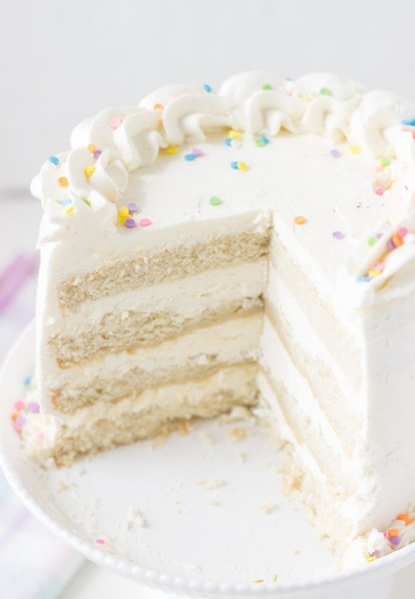Traditional Vanilla Bean White Layer Cake - a gentle, fluffy and delicious vanilla cake recipe high quality for any birthday occasion.   Traditional Vanilla Bean White Layer Cake with classic vanilla bean white layer cake 1 600x866