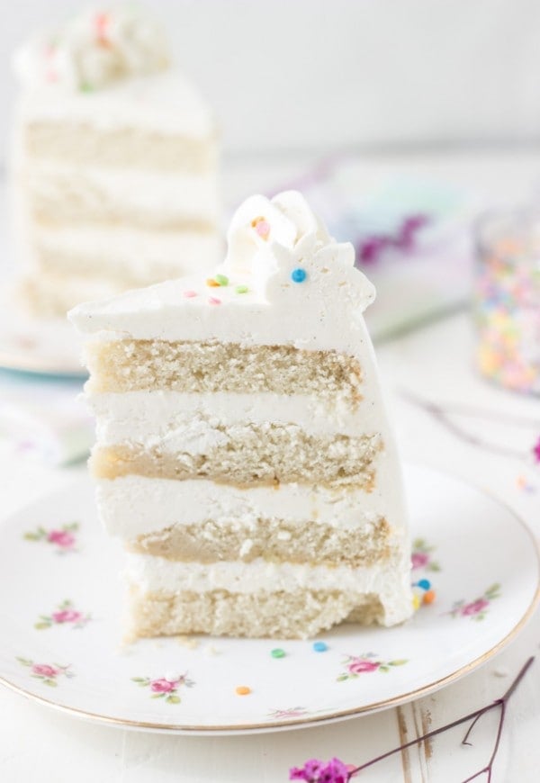 Classic Vanilla Bean White Layer Cake - a soft, fluffy and delicious vanilla cake recipe perfect for any birthday celebration. 