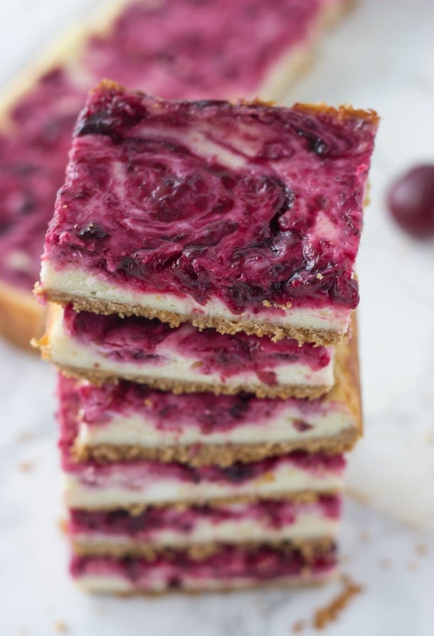 A sweet cheesecake filling is topped with a tart cherry swirl in these cherry lime cheesecake bars