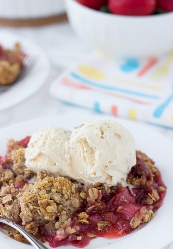 This strawberry raspberry rhubarb crumble is bursting with sweet and tart juices on the inside and topped with a gluten-free coconut oatmeal crumb topping. 