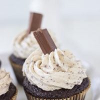 Kit Kat cupcakes are a great Halloween treat! A moist chocolate cupcake, frosted with a whipped Kit Kat candy bar buttercream.
