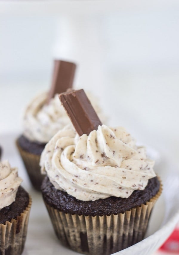 A moist chocolate cupcake with a whipped kit kat buttercream makes these Kit Kat Cupcakes a great Halloween treat!