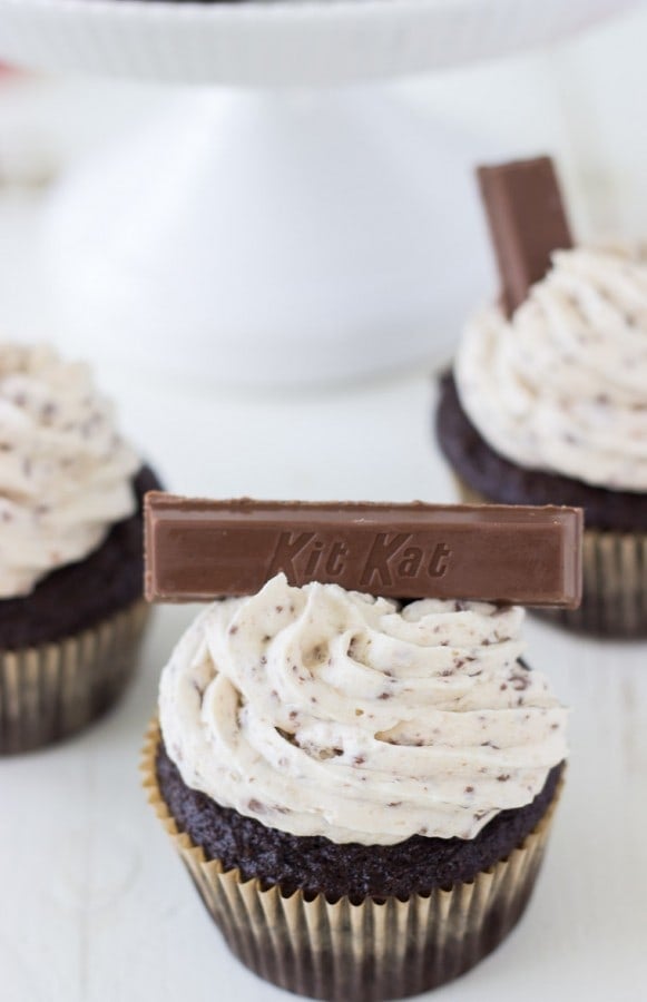 A moist chocolate cupcake with a whipped kit kat buttercream makes these Kit Kat Cupcakes a great Halloween treat!