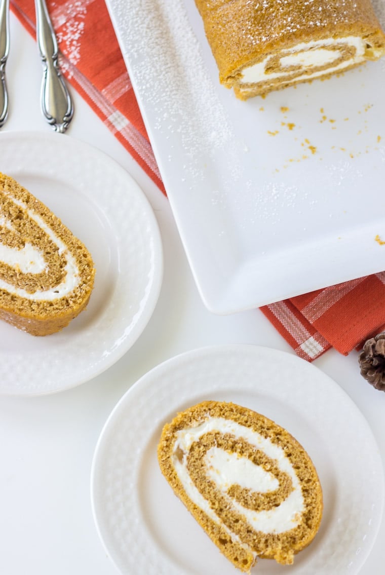 A classic pumpkin roll cake with a spiced ginger cream cheese frosting. 