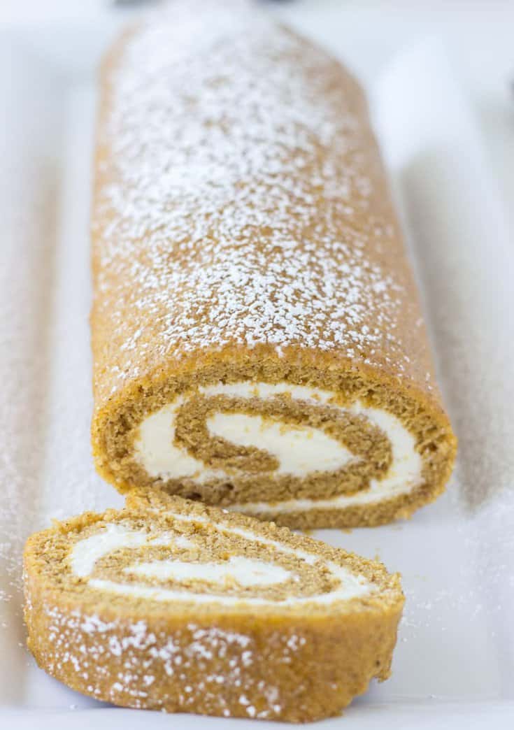 A classic pumpkin roll cake with a spiced ginger cream cheese frosting. 