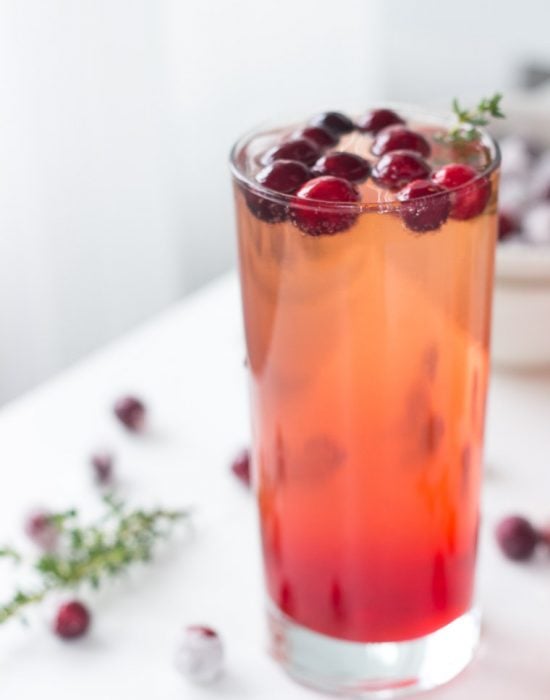 Refreshing Cranberry Thyme Sparklers made bubbly with 7UP or Ginger Ale make for a simple and easy holiday cocktail.