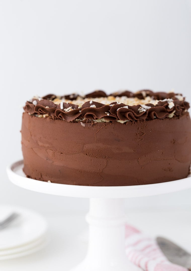 This classic German Chocolate Cake is a rich chocolate cake, filled with a coconut pecan filling and finished off with a decadent chocolate frosting.