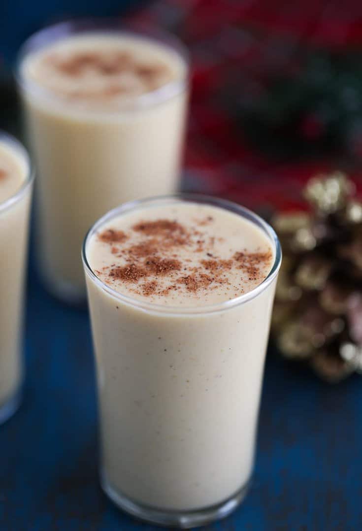 Homemade pumpkin eggnog recipe with a splash of bourbon - creamy, delicious and warm! 