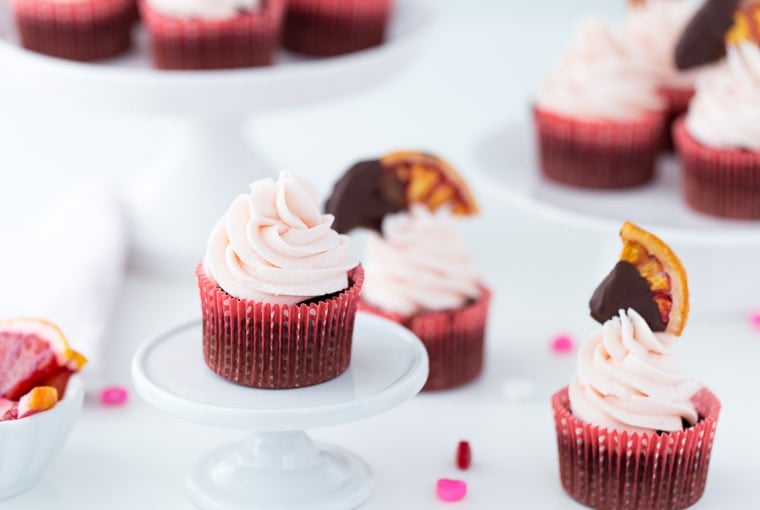 A classic chocolate cupcake recipe with sweet orange zest and blood orange buttercream. These Blood Orange Chocolate Cupcakes are a wonder! 