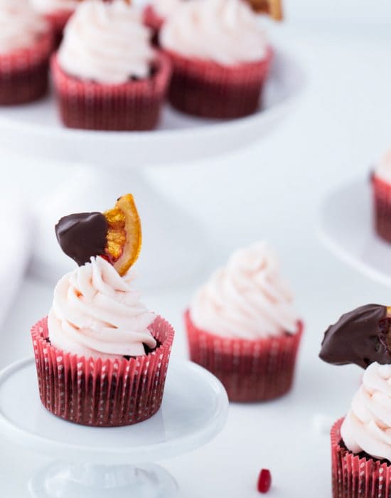 A classic chocolate cupcake recipe with sweet orange zest and blood orange buttercream. These Blood Orange Chocolate Cupcakes are a wonder!