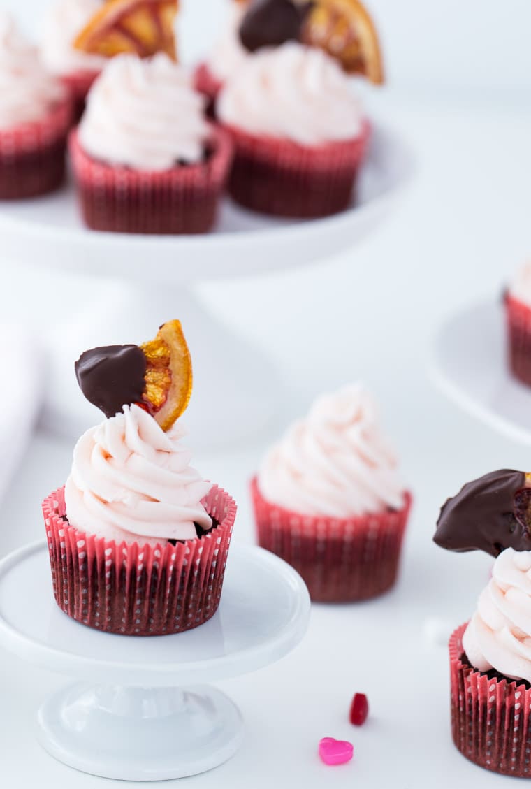 A classic chocolate cupcake recipe with sweet orange zest and blood orange buttercream. These Blood Orange Chocolate Cupcakes are a wonder! 