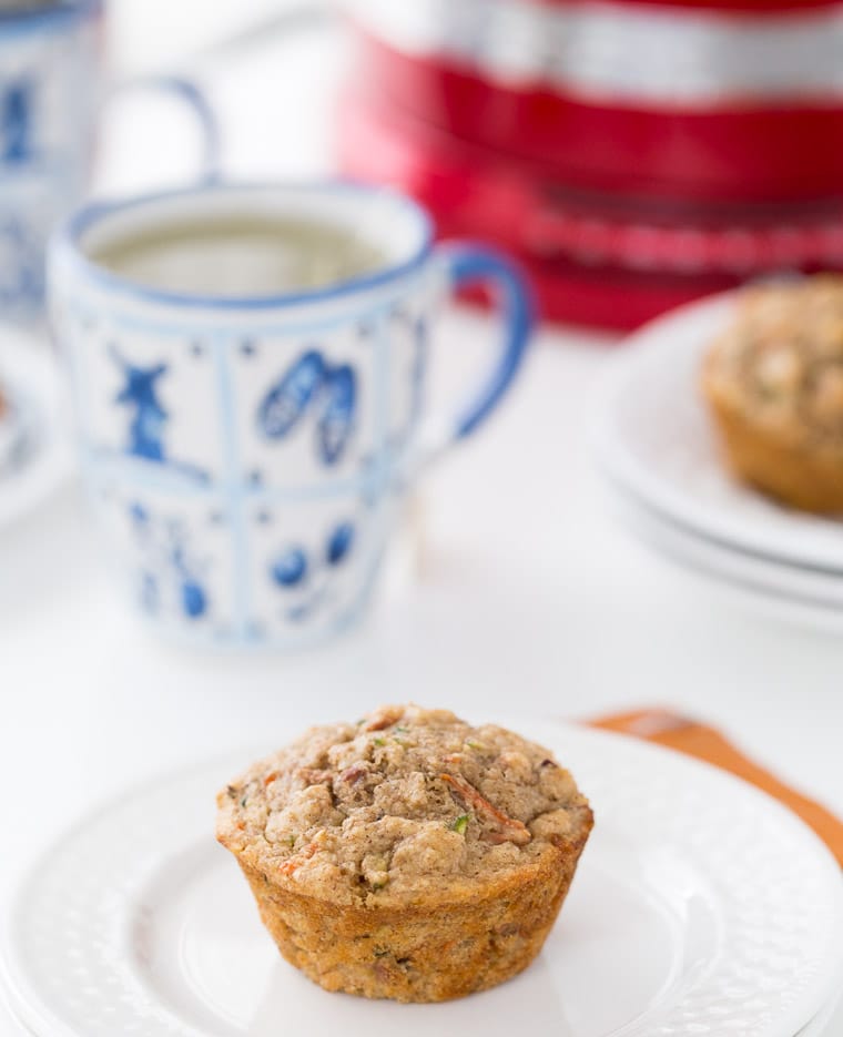 Filled with spiralized zucchini and carrots, whole wheat flour and natural sweeteners, these zucchini carrot muffins are perfect for a healthy breakfast.