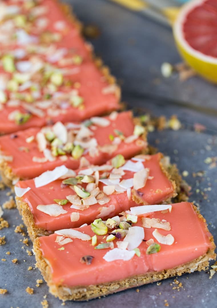 This grapefruit tart recipe starts with a crunchy graham cracker crust with toasted coconut and is filled with a sweet, tangy grapefruit curd. 