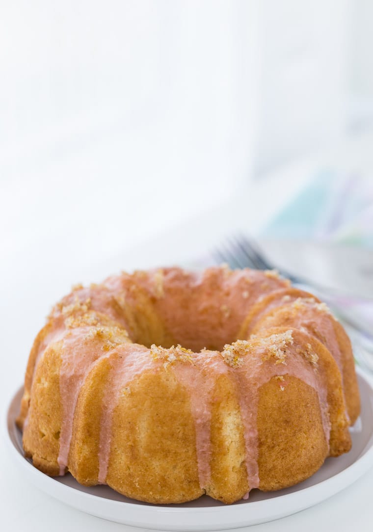 A rich grapefruit pound cake with vanilla bean and grapefruit glaze. This grapefruit vanilla bean pound cake recipe is crumbly, tender and delicious. 