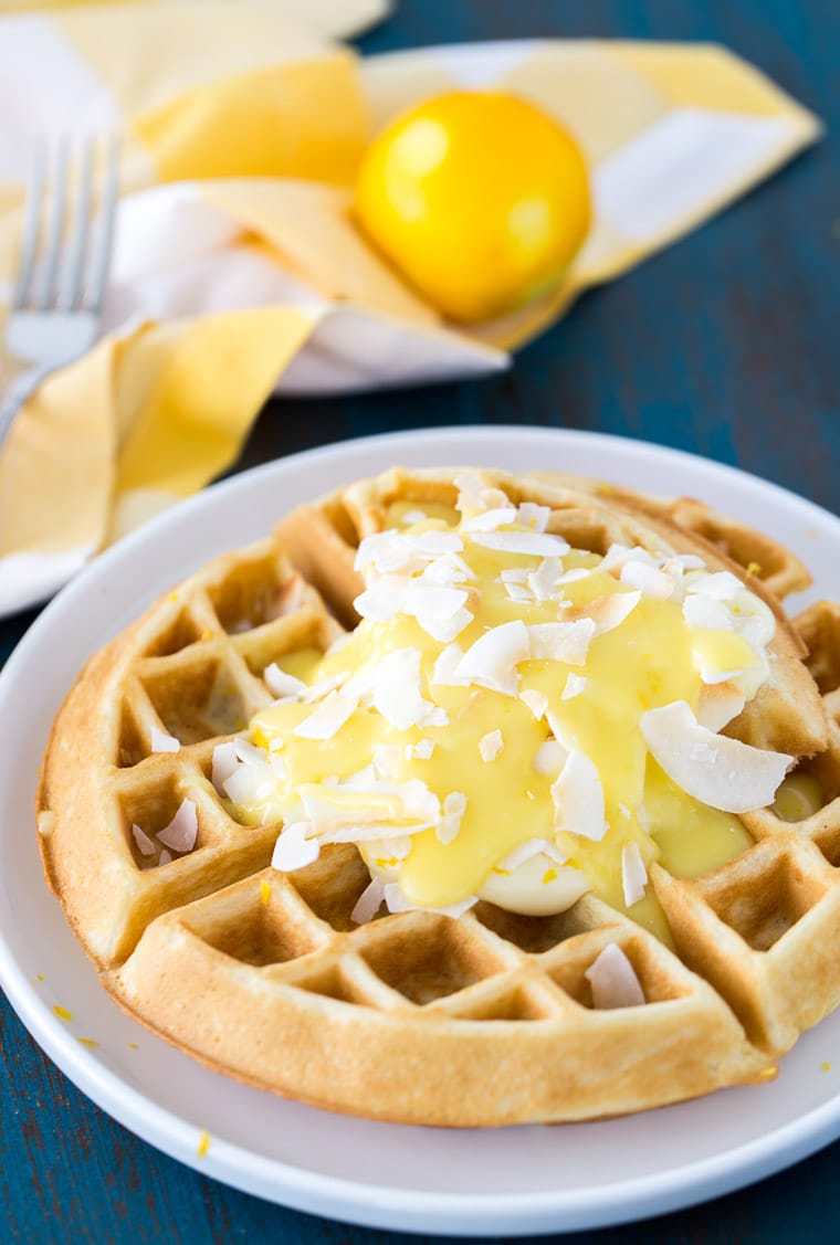These coconut lemon creme waffles takes your ordinary waffle recipe to a new level with coconut and lemon zest in the waffles to a creamy lemon pie topping. 