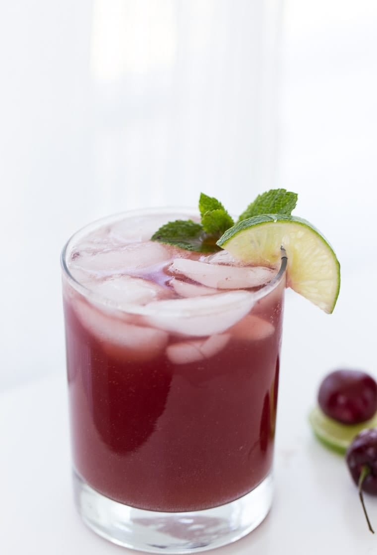 This homemade sparkling cherry limeade recipe has a subtle hint of almond and is perfect for any summer BBQ or picnic. 