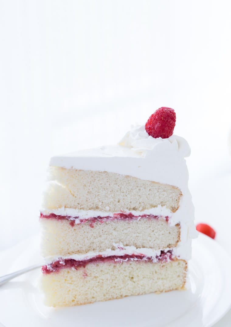 Coconut Raspberry Cake with Whipped Cream Frosting