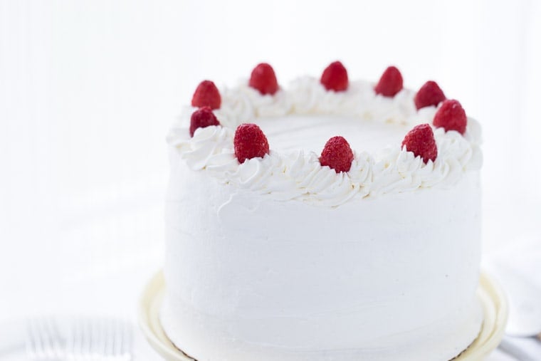 Coconut Raspberry Cake with Whipped Cream Frosting