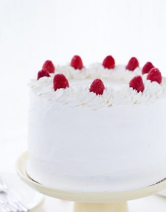 Coconut Raspberry Cake with Whipped Cream Frosting