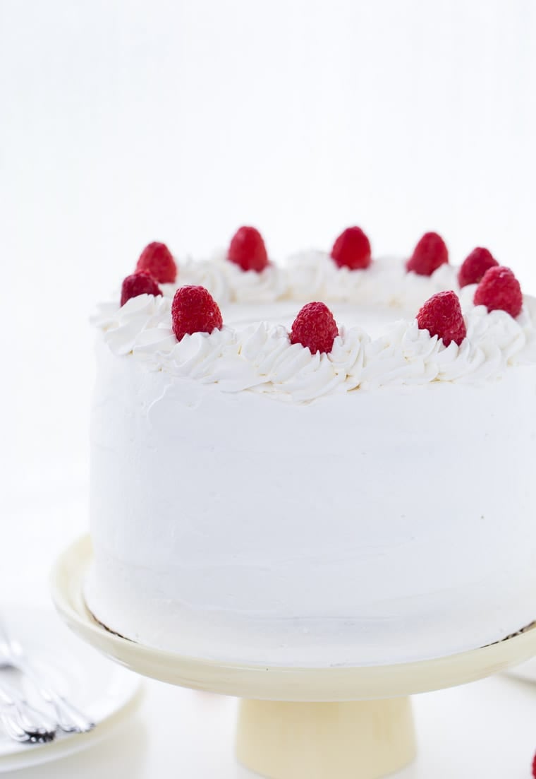 Coconut Raspberry Cake with Whipped Cream Frosting