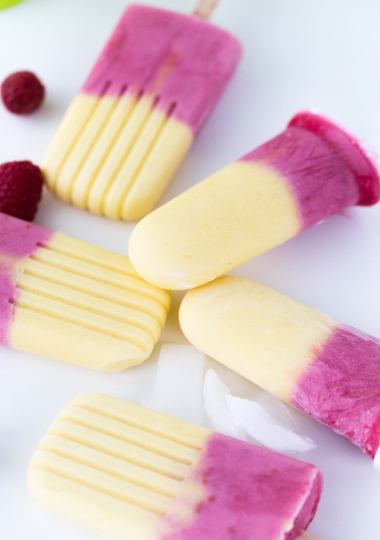 These raspberry mango yogurt pops are naturally sweetened, creamy and delicious!